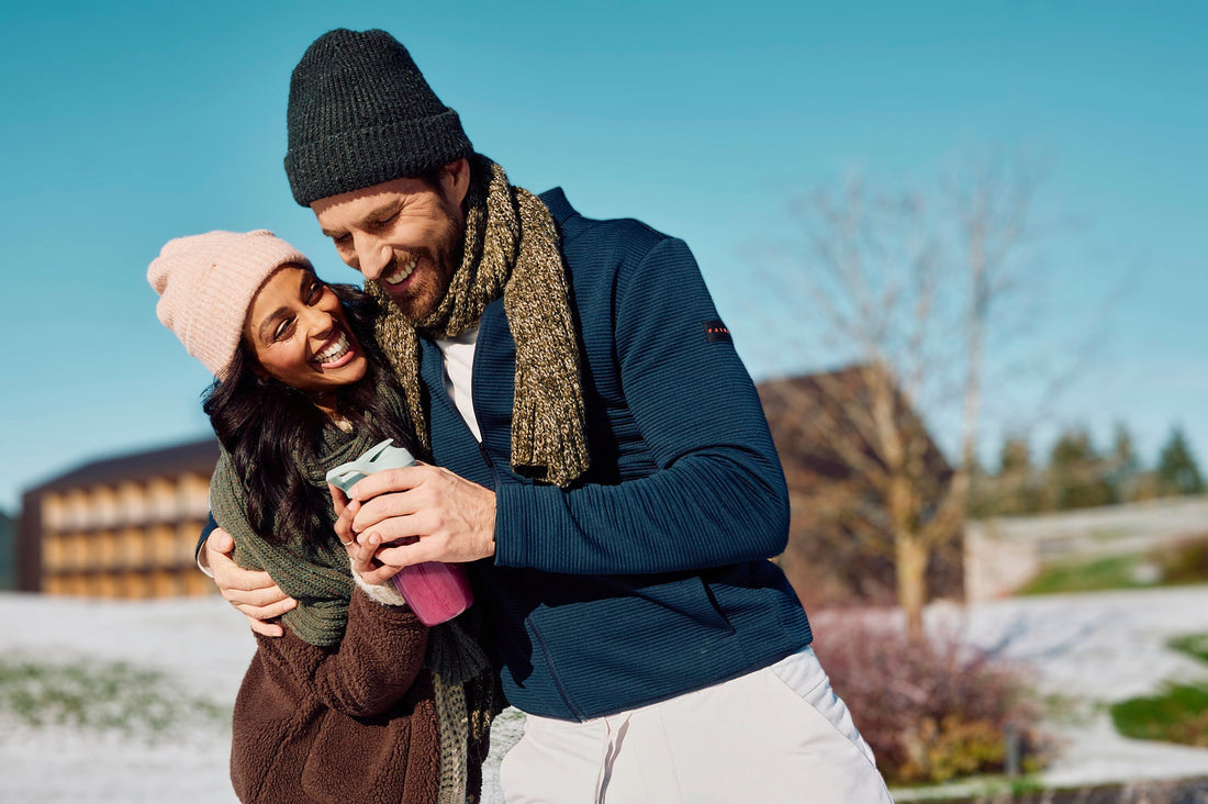 Couple laughing together outdoors