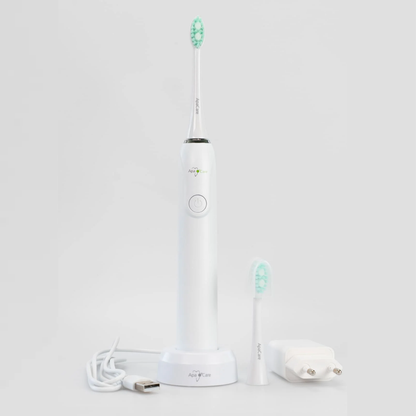 ApaCare Sonic Change toothbrush with charging base, spare brush head and plug